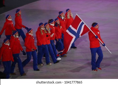 PYEONGCHANG, SOUTH KOREA - FEBRUARY 9, 2018: Emil Hegle Svendsen Carrying The Flag Of Norway Leading The Olympic Team Norway At The PyeongChang 2018 Winter Olympics Opening Ceremony