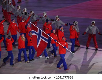 PYEONGCHANG, SOUTH KOREA - FEBRUARY 9, 2018: Emil Hegle Svendsen Carrying The Flag Of Norway Leading The Olympic Team Norway At The PyeongChang 2018 Winter Olympics Opening Ceremony