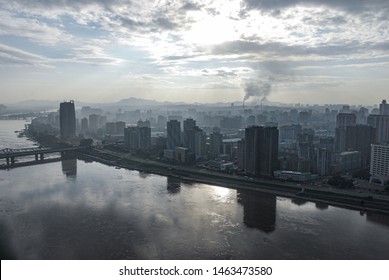 Pyongyang, North Korea, 2 August 2014. Skyline of the North Korean capital with Taedong river on a summer day seen from Yanggakdo hotel