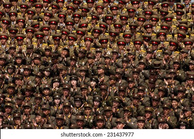 PYONGYANG, NORTH KOREA - CIRCA APRIL 2012: North Korea Army Officers Cheers For Kim Jong-Un At The Military Parade Celebrate Centenary Birth Of President Kim Il Sung.