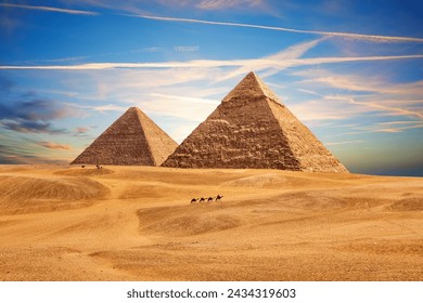 The Pyramid of Chephren and the Pyramid of Cheops in the sands of Giza desert, Egypt