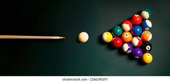 Pyramid Made Of Billiard Balls And Cue On Table, Top View