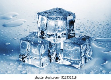 Pyramid of melted ice cubes with drops