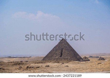 Pyramid of Menkaure Mycerinus with granite stones, Giza desert, funerary temple