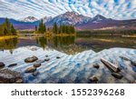 PYRAMID MOUNTAIN (Pyramid Lake) WITH PERFECT REFLECTION AND AMAZING CLOUD FORMATION, JASPER, ALBERTA, CANADA