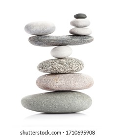 Pyramid of sea pebbles. Isolated on white background. Life balance and harmony concept