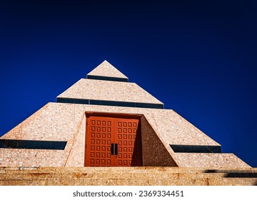 Pyramid Structure with Red Doors