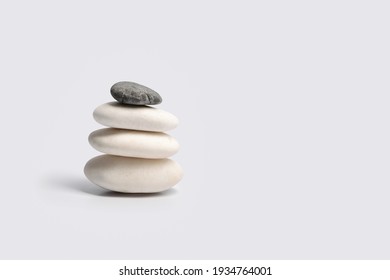 Pyramid of Zen stones in absolute emptiness.  Minimalism concept.