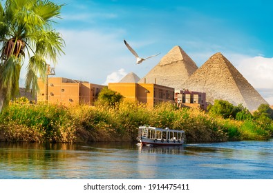 Pyramids near the Nile River at sunset
