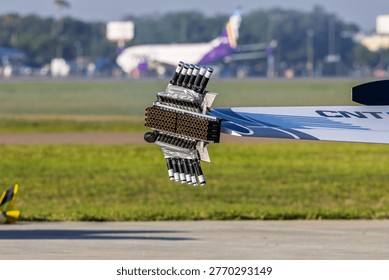 Pyro attachments to the wing of an airplane