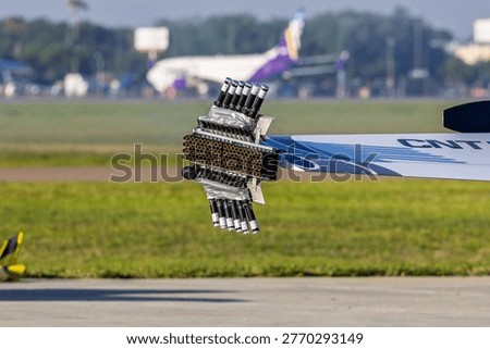 Pyro attachments to the wing of an airplane