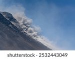 Pyroclastic flows seen sliding down  Merapi volcano. eruption observed from Babadan Observation Post