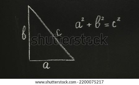 Pythagorean theorem on a chalkboard. Handwritten letter