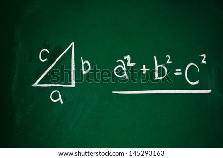 Pythagorean theorem sketched with white chalk on a chalk board
