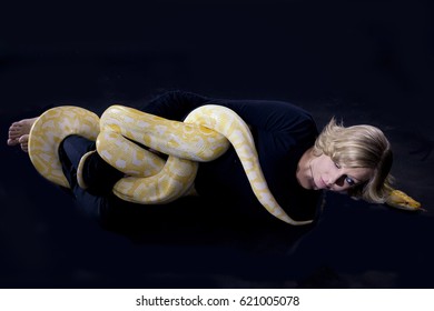 Python Is Strangling A Woman