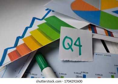 Q4 4th Quarter Period Write On Sticky Notes Isolated On Office Desk. Stock Market Concept