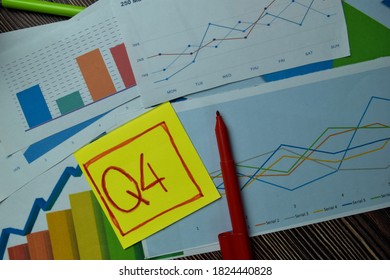 Q4 4th Quarter Period Write On Sticky Notes Isolated On Office Desk. Stock Market Concept