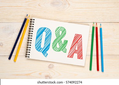 Q&A, questions and answers with colorful pencils concept - Shutterstock ID 574092274