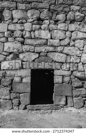 Qasr al-Azraq (Azraq Castle): Historic black basalt Roman Ayyubid fortress in Jordan's desert. Famous T.E. Lawrence Arab Revolt HQ.