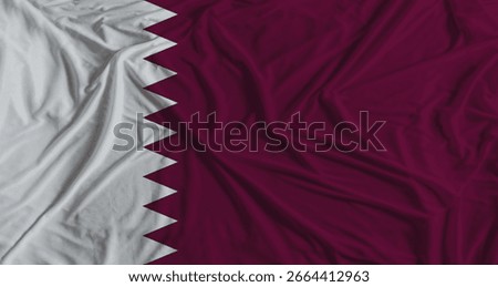 Qatari flag with fabric texture background. National flag of Qatar with cloth texture