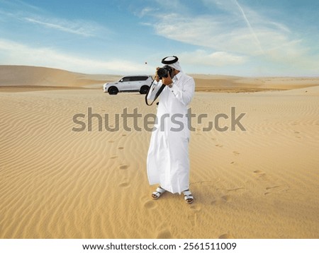 Qatari Guy in the Middle of the Sand dunes