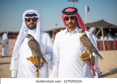 Qatari Youth Carrying Falcon On Hand, For Use In Hunting Birds, Alzakherah, North Of Qatar June 13, 2013