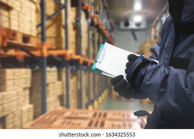 QC. Worker Checking Goods On Delivery In The Cold Room Warehouse., Logistics Food And Beverage In Cold Storage Concept