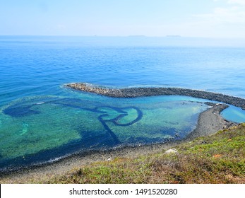 Qimei Twin-Hearts Stone Weir. Is a famous attraction in Penghu Taiwan. It is the way the ancients used tidal fishing.