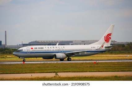 Qingdao, China- August 18,2022: A White Air China Passenger Plane Is Parked On The Runway