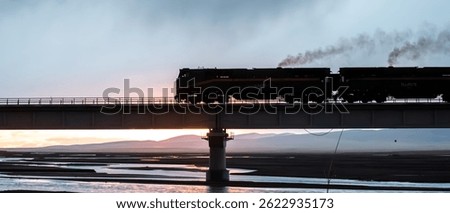 The Qinghai-Tibet Train Under the Setting Sun