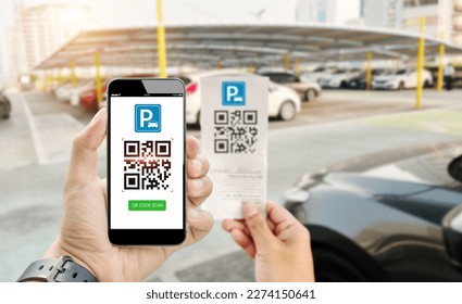 Qr code can parking payment concept.Hand holding mobile phone on blurred parking lot as background
 - Powered by Shutterstock