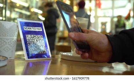 QR Code Cashless Payment. Scan To Pay Business System In The Restaurant, Bar And Cafe. To Use A QR Code Payment The Consumers Scans The QR Code Displayed By The Merchant With Their Phone