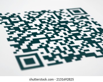 A QR code close up colored on the white background