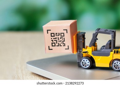 QR code concept. Product labeling on the box. Process optimization in logistics and delivery
