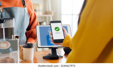 QR code payment, customer using smartphone for paying at shop - Shutterstock ID 2144417971
