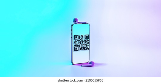 Qr code payment. Digital mobile smart phone with qr code scanner on smartphone screen for pay, scan barcode technology on neon background. Online shopping, cashless society technology concept
