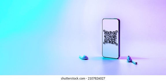 Qr code payment. Digital mobile smart phone with qr code scanner on smartphone screen for pay, scan barcode technology on neon background. Online shopping, cashless society technology concept