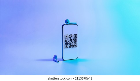 Qr code payment. Digital mobile smart phone with qr code scanner on smartphone screen for pay, scan barcode technology on neon background. Online shopping, cashless society technology concept