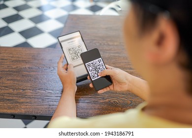 Qr code payment. E wallet. Man scanning tag accepted generate digital pay without money.scanning QR code online shopping cashless technology concept