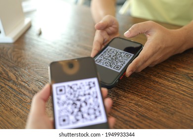 Qr code payment. E wallet. Man scanning tag accepted generate digital pay without money.scanning QR code online shopping cashless technology concept - Powered by Shutterstock - Get 15% off with code: PIKWIZARD15