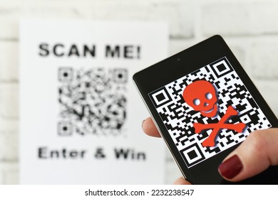 QR code scam concept - scanning a QR code can lead to phishing websites or malware apps. A female scanning a fraudulent QR code that is way for cons to steal your passwords and other valuable info - Powered by Shutterstock