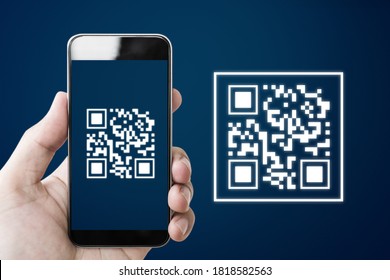 QR code scanning payment and verification. Hand using mobile smart phone scan QR code