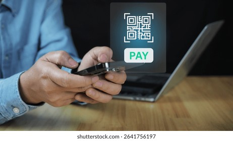 QR code scanning payment and verification. Hand using mobile smart phone scan QR code Qr code payment , online shopping , cashless technology concept. Shop or store accepted digital pay without money.