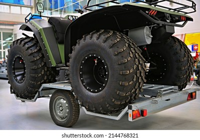 Quad Bike With Big Wheels Car On A Trailer