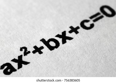 Quadratic Equation Printed On Paper. Macro Mode.