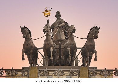 Quadriga. Four-horsed chariot. Statue on the portico of the Ducal Palace, Residence Palace in Braunschweig, Lower Saxony, Germany. City goddess Brunonia as the charioteer.