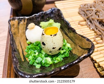 Quail Egg Side Dish With Onion And Coriander Garnish