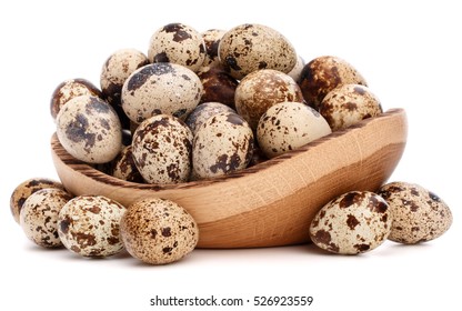 quail eggs in wooden bowl isolated on white background cutout