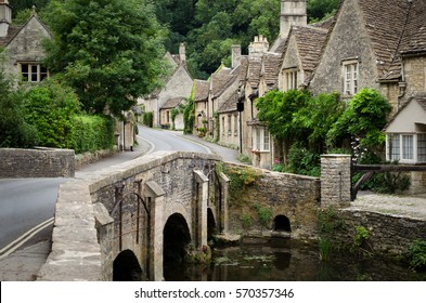 Quaint Castle Combe village with its characteristic bridge in the Cotswolds, UK. Rural England at its best.