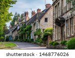 Quaint Cotswold romantic stone cottages on The Hill,  in the lovely Burford village, Cotswolds, Oxfordshire, England 
